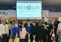 L To R L Dean, G Iqbal, T Bowker, O Eastmond, L Smith, M Taylor, D Grimes, J Lisic And Pupils At St Hugh's Primary School
