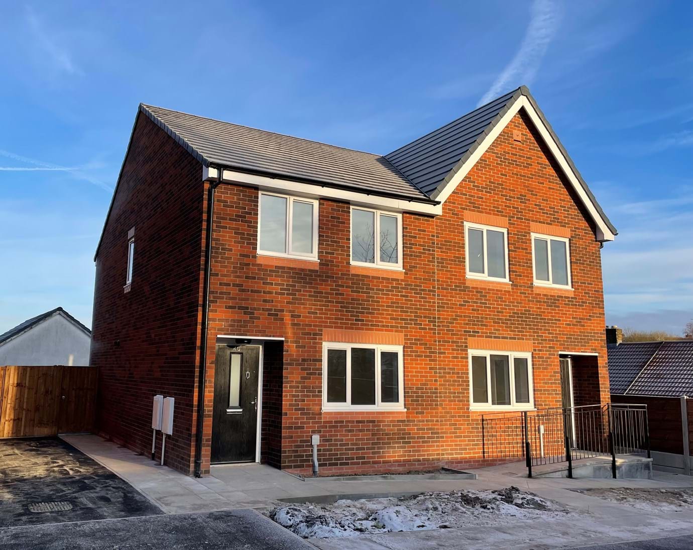 Tanners Fold development of 24 three bedroom family houses for affordable rent