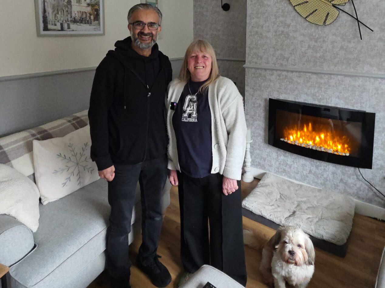 Left To Right Asam Rashid FCHO Customer Liaison Officer And Sylvia Johns With Her Dog Rupert